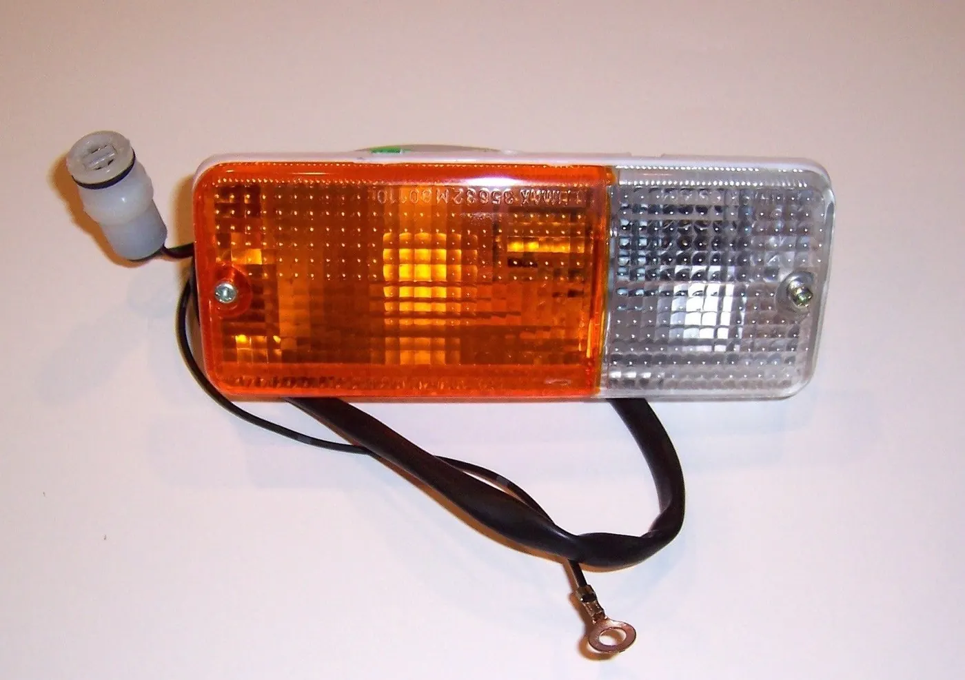FRONT TURN SIGNAL RUNNING LIGHTS/DRIVER (OEM) – SAMURAI ’80-’95