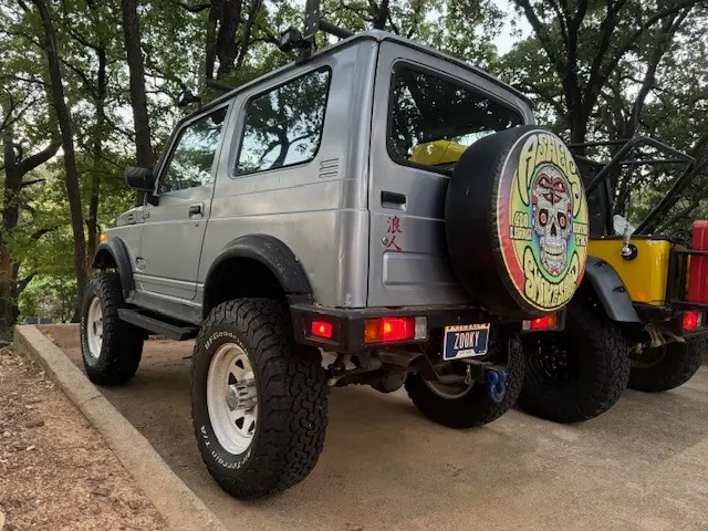silver suzuki ZOOKY